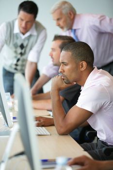 Office workers at computers