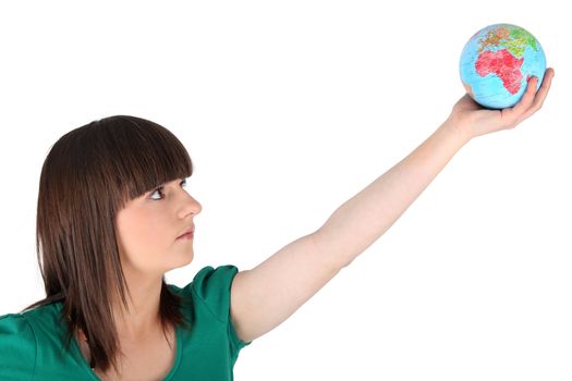 Girl holding the world in the palm of her hand