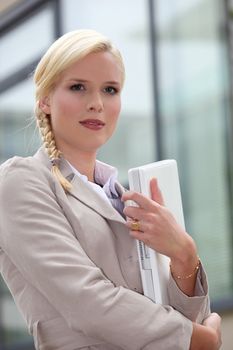 Woman holding laptop