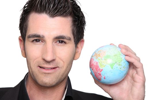 Man with globe in hand
