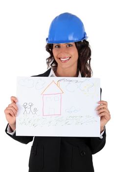 Architect holding a child's drawing of a house