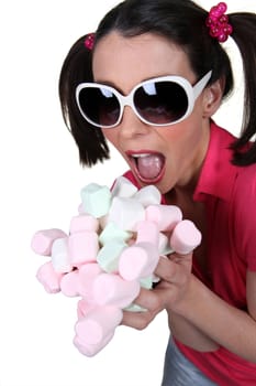 Girl going crazy for marshmallows