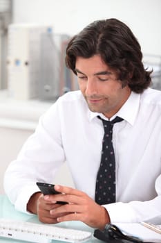 man text messaging someone