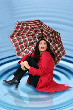 beautiful young woman under her umbrella