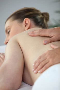 Woman having a back massage