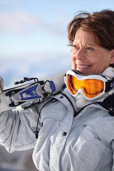 Mature female skier