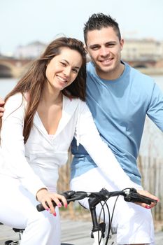 a couple doing bike