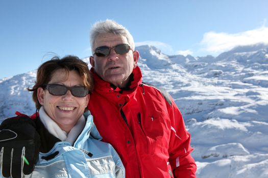 Senior couple on holidays in the mountain