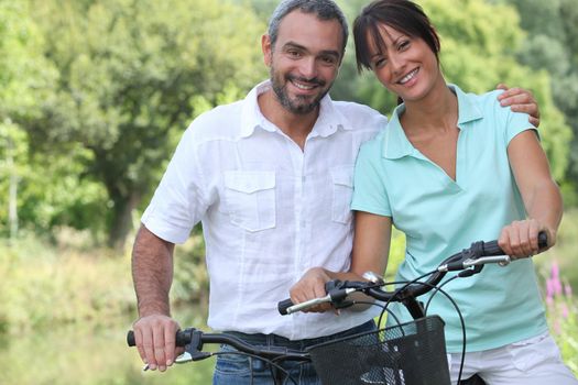 Couple riding bikes