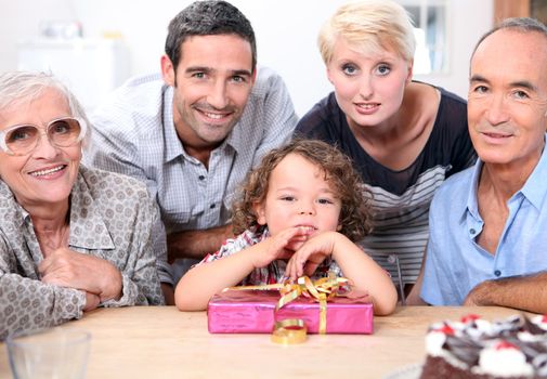 Family celebrating little boy birthday