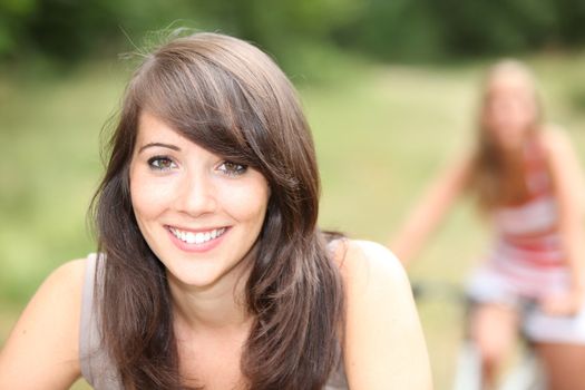 portrait of a young woman on bike