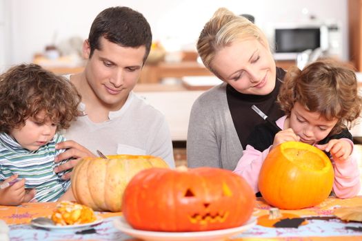 family preparing Halloween together