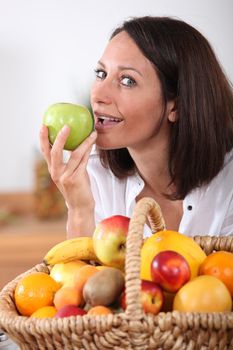 portrait of a woman with fruit basket