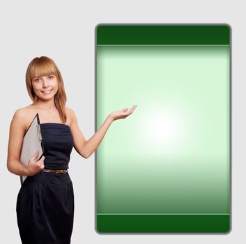 beautiful woman shows a screen with copyspace