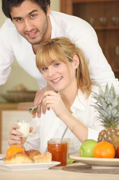 Young couple having breakfast