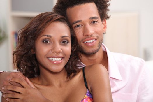 Young African couple at home