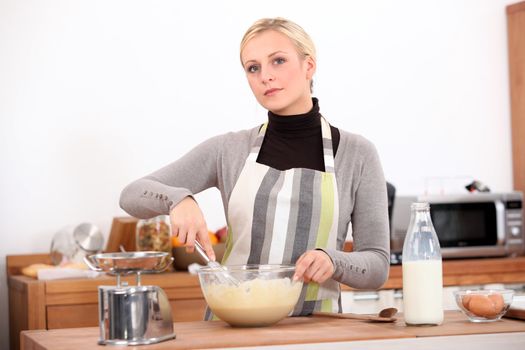 blonde cooking at home