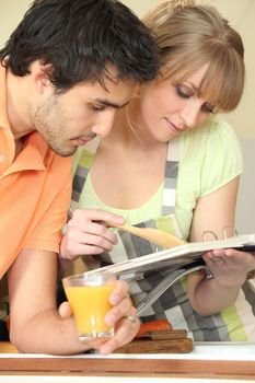 Couple with cook book