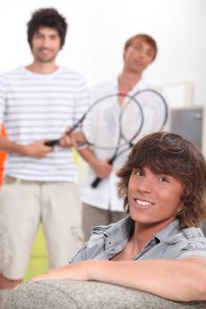 portrait of a young man with friends