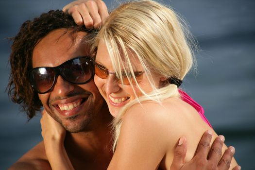 Portrait of a young couple at the beach