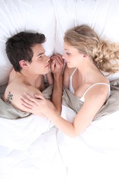 Young couple in a bed