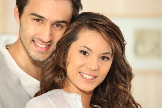 Young man smiling and Asian girl