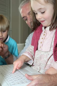 Grandfather sat with kids