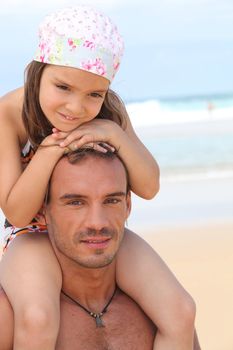 dad and daughter at beach