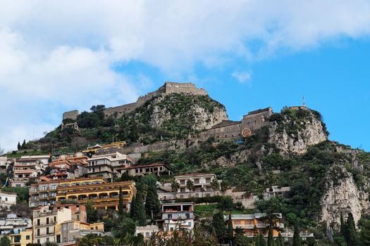 Monte Tauro with Saracen Castle and Santuario Madonna della Rocca above Taormina in Sicily,Italy