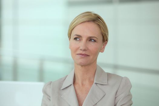 Blond woman thinking