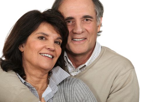 Middle-aged couple stood together