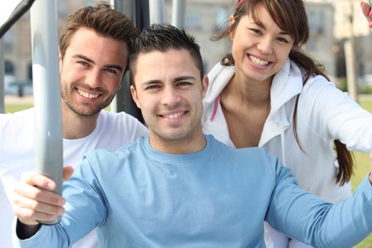 Three friends working-out outdoors