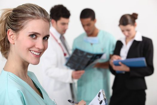 A team of doctors conferring