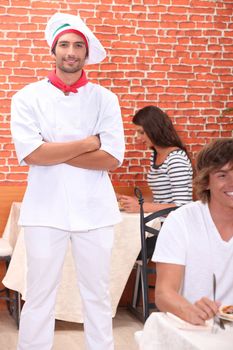 Cook standing in a restaurant
