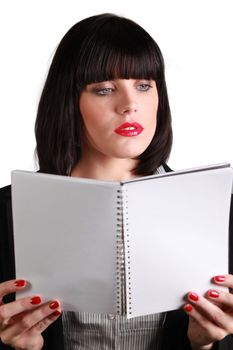 Smart businesswoman holding notebook