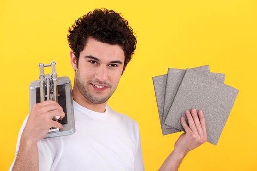 Man holder tiles and cutting device