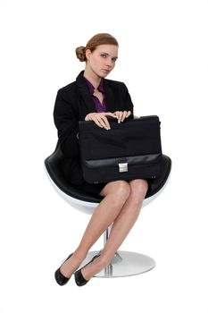 Shy applicant waiting in an armchair