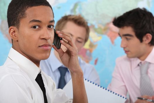 Young executive making a phone call