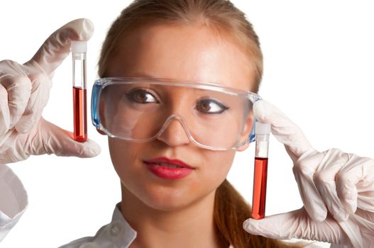 Women looking at laboratory test tubes