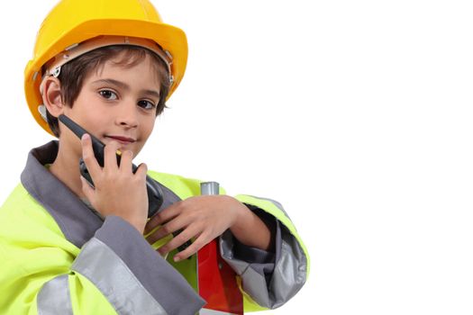 Young boy pretending to be a traffic guard