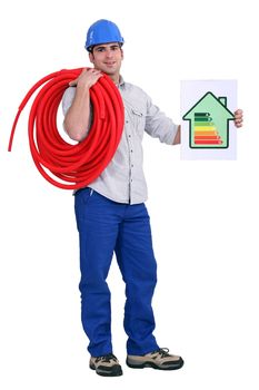 craftsman holding an energy consumption label