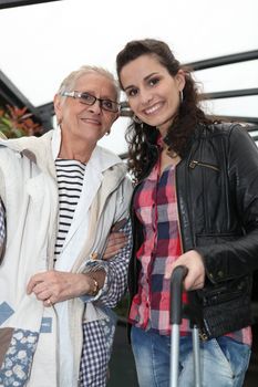 Grandmother and granddaughter smiling