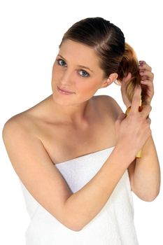 woman taking care of her hair