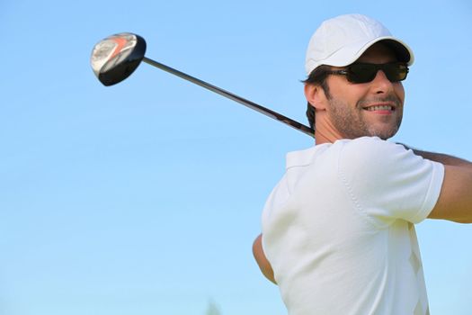 man playing golf