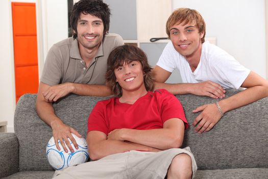 three roommates in their apartment