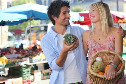 elegant couple doing their market