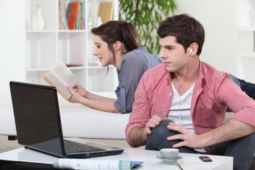 Couple relaxing at home
