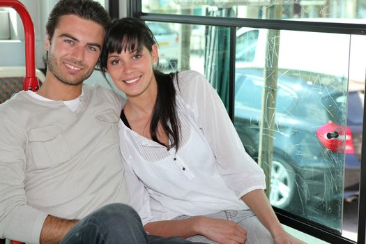Young people sitting in a bus