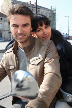 Couple on a moped