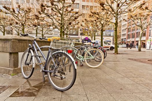 Bicycles locked on a bike rack in Downtown  Frankfurt, Germany